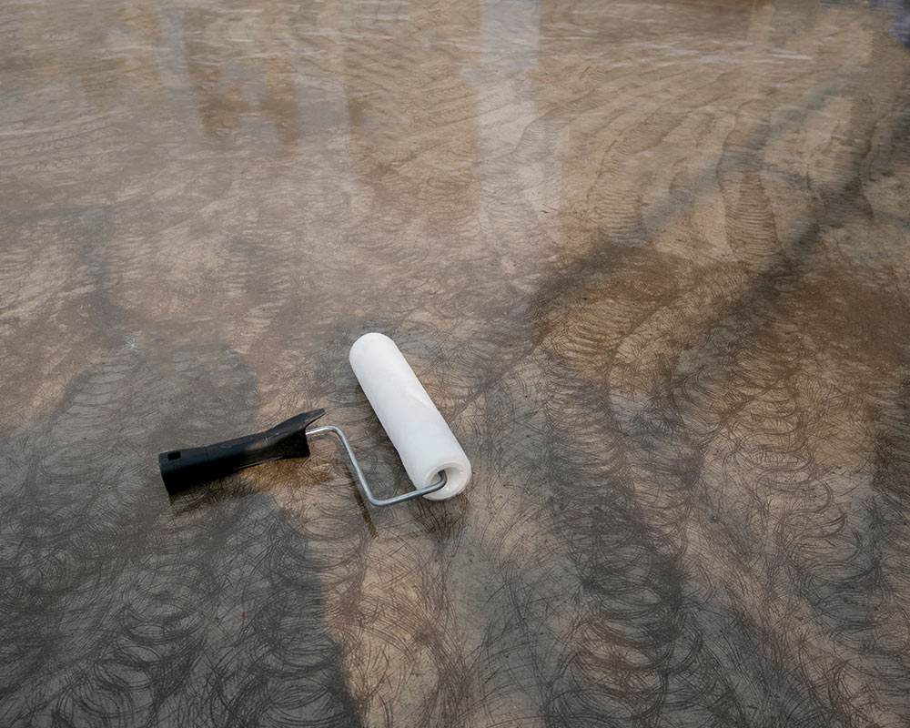 Blacktip Flooring Solutions roller-painting-over-epoxy-floor-columbus-oh